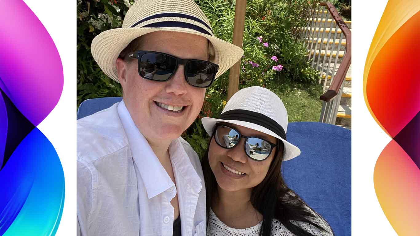 Picture of two people in sunglasses and hats.